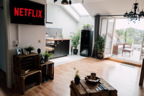 Rooftop Buddha Lounge - Ferienwohnung im Dachgeschoss in Leipzig mit Waschmaschine und Netflix